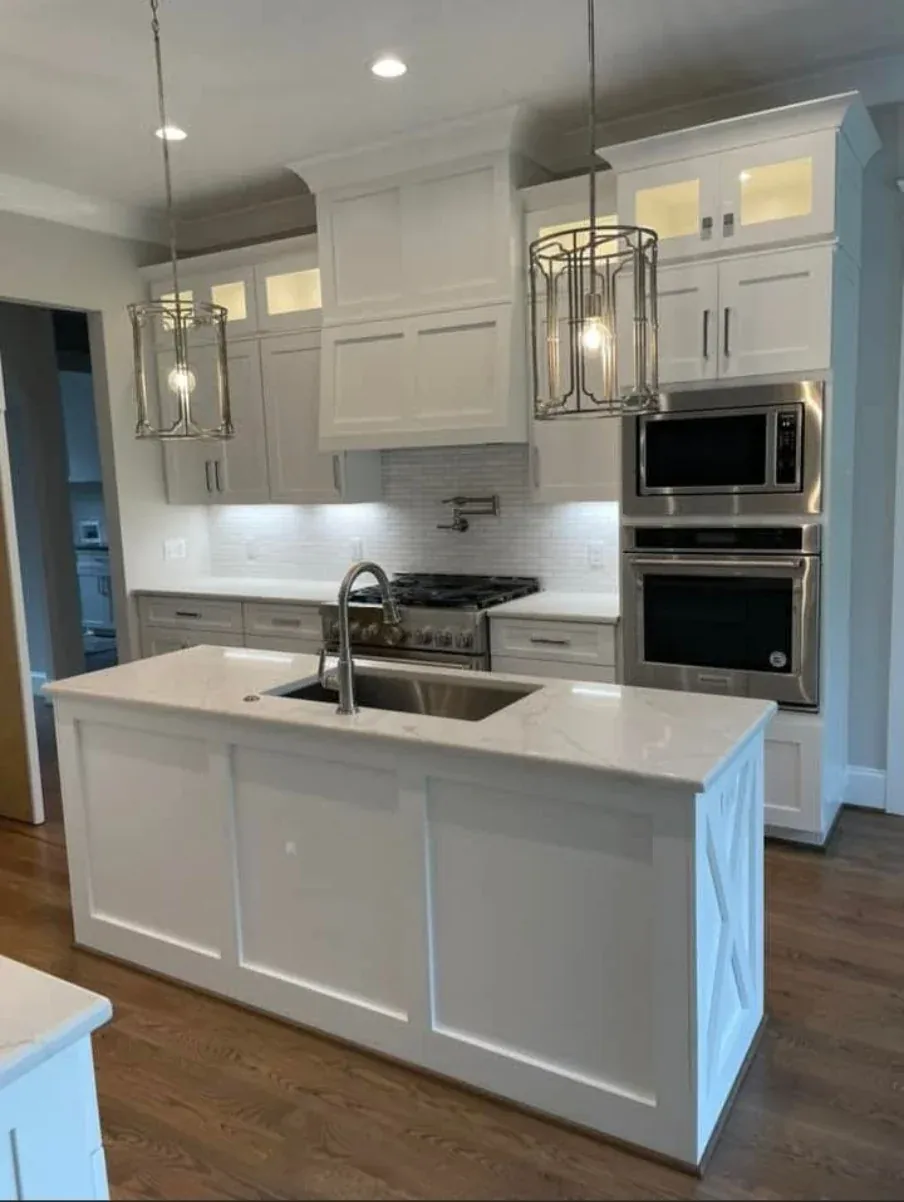 White kitchen cabinets with island